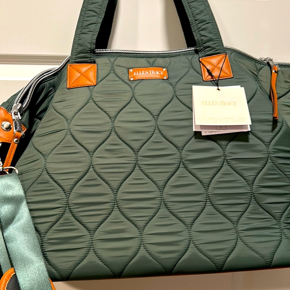 This Ellen Tracey tote bag will meet all your travel needs.